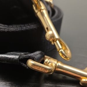 Coach Black Leather Strap with Gold Accents